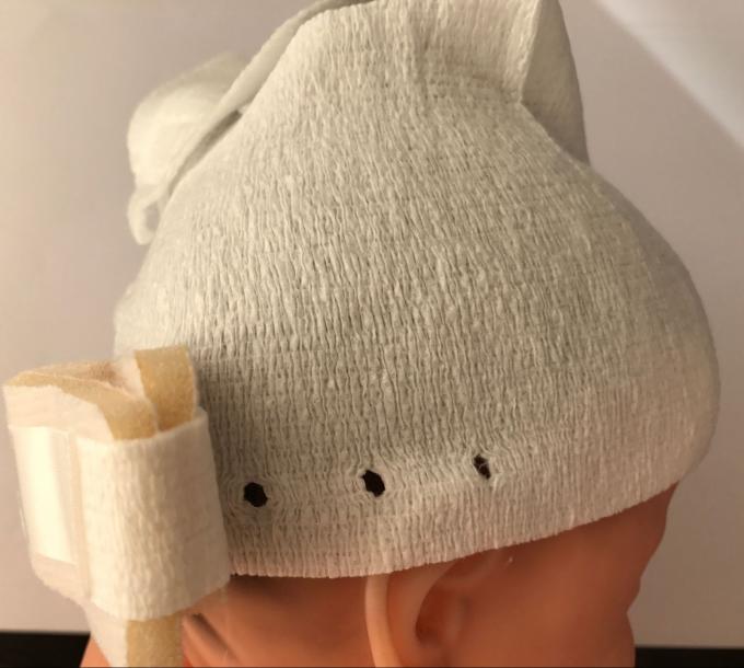 Os chapéus infantis do bebê da tela não tecida absorvem o suor para a proteção principal